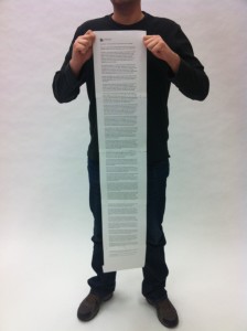 Here I am holding a print out of Madore's post in size 14 font. For reference, I stand 6 feet 2 inches tall.