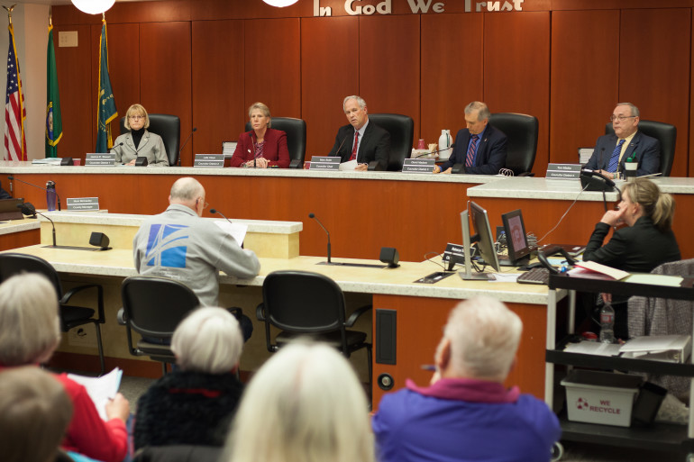 The newly expanded Clark County council held its first meeting Tuesday. Councilor Jeanne Stewart, from left, Councilor Julie Olson, Council Chairman Marc Boldt, Councilor David Madore and Councilor Tom Mielke kicked off the year with a long, contentious meeting. (Tommy Rhodes for the Columbian)