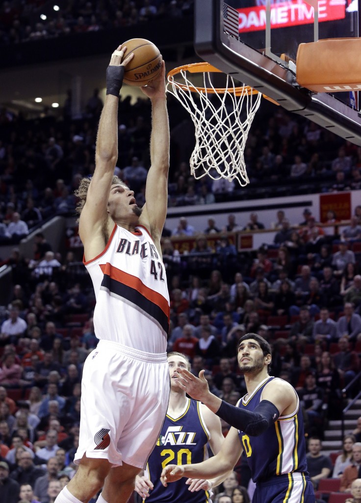 Kanter (right) will be giving up dunks in Oklahoma City, not Portland next season. (AP Photo/Don Ryan)