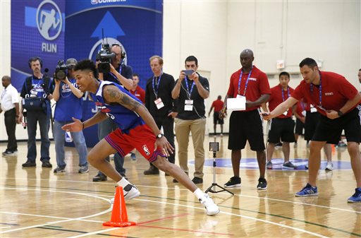 Kansas' Kelly Oubre participates in a drill at the NBA draft combine. (AP Photo/Charles Rex Arbogast)
