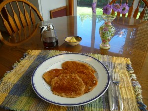 Oatmeal pancakes with real butter and a bit of syrup