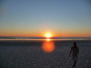 Viki enjoying the sunrise on Crescent Beach, Florida