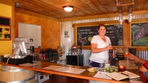 Michelle Parker, co-owner of Koi Pond Cellars, presiding over the bright and cozy tasting room