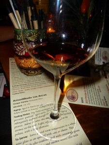The amber color of this Amontillado Los Arcos Sherry is easy to sip as an aperitif or a hearty cheese plate 
