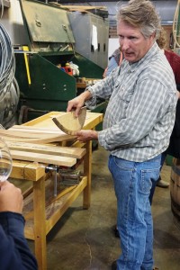 Rick DeFerrari, owner of Oregon Barrel Works in McMinnvile, explains the process of custom cutting the heads for barrels. OBW is not open to the public for tours but recently participated in a private event as part of the Bounty of Yamhill County. Viki Eierdam    
