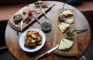 A sampling of Southeast Wine Collective’s food menu includes Valencia almonds, house-made charcuterie, castelvetrano olives and cheeses sourced from nearby Cheese Bar. Viki Eierdam