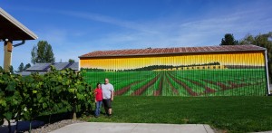 Julie and Steve, owners of Jacquot Farm and Vineyard, are conscious to hire local craftsmen for property projects like this eye-catching mural that graces one side of a large outbuilding. Viki Eierdam   