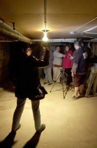 Members of the "Ghost Hunters" use digital cameras to check the basement of The Academy for orbs and other spirits.(Steven Lane/The Columbian)