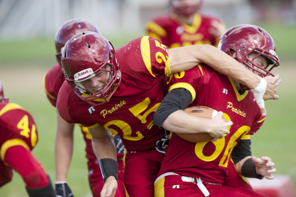 Prairie high school football player Jason Bracken , #25, runs through drills at practice, Thursday, August 29, 2013..  (Steven Lane/The Columbian)