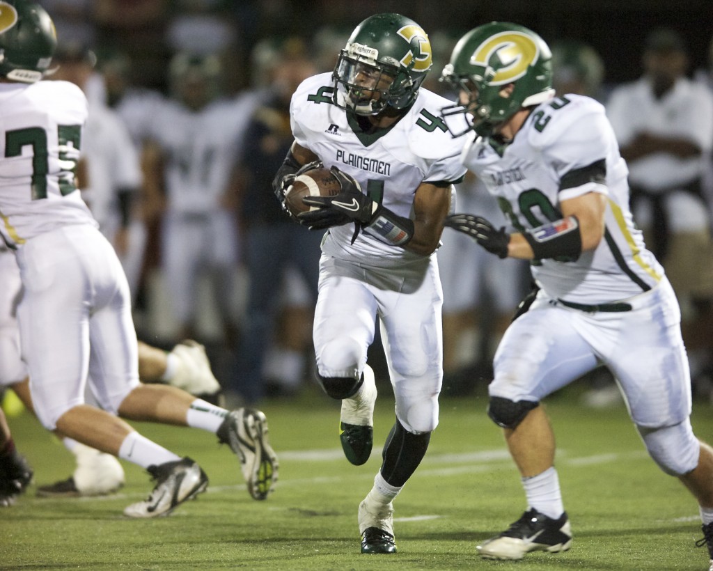Evergreen's Robert Akil runs the ball against Prairie in the second half at District Stadium on Friday September 20, 2013. (Zachary Kaufman/The Columbian)