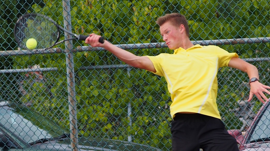 Columbia River's No. 1 singles Owen Carlson in action at Prairie on Wednesday, Oct. 1, 2014.