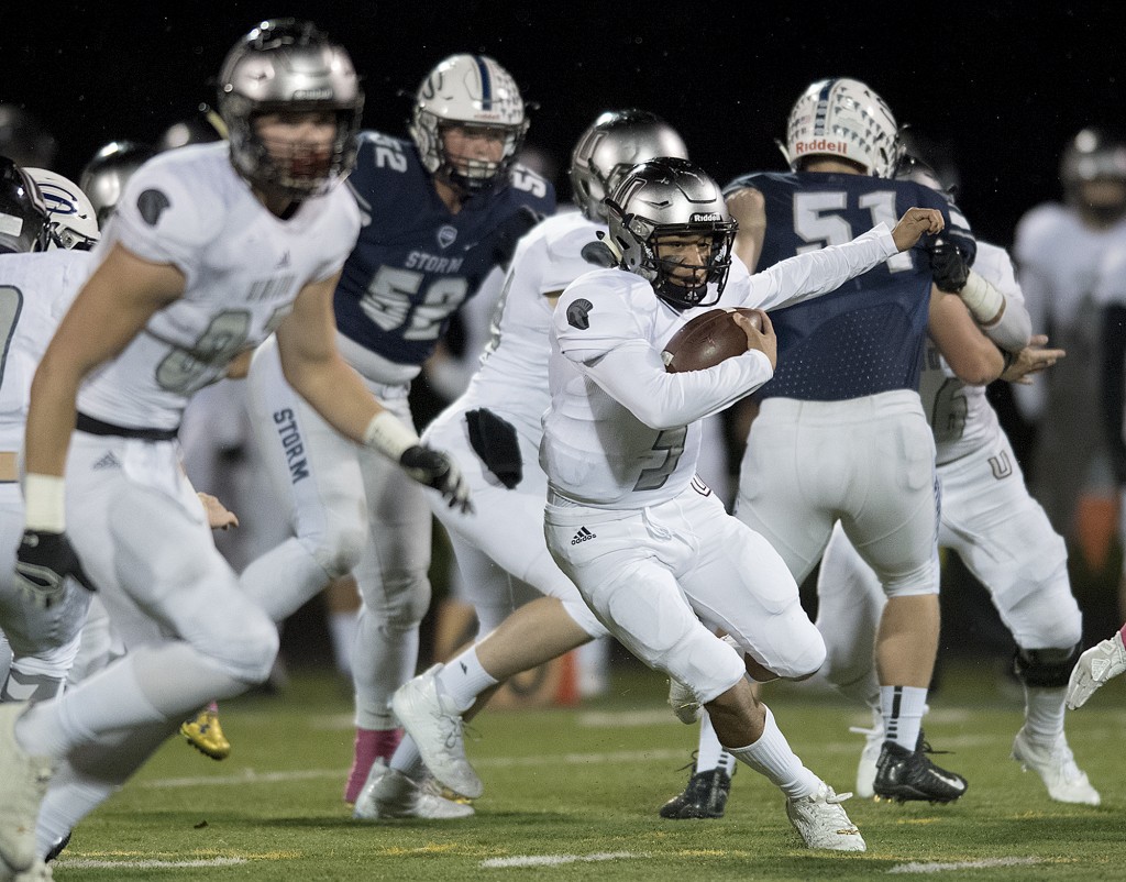 Union's Lincoln Victor (5) finds room to run in the first quarter at Kiggins Bowl on Friday night, Oct. 20, 2017. (Amanda Cowan/The Columbian)