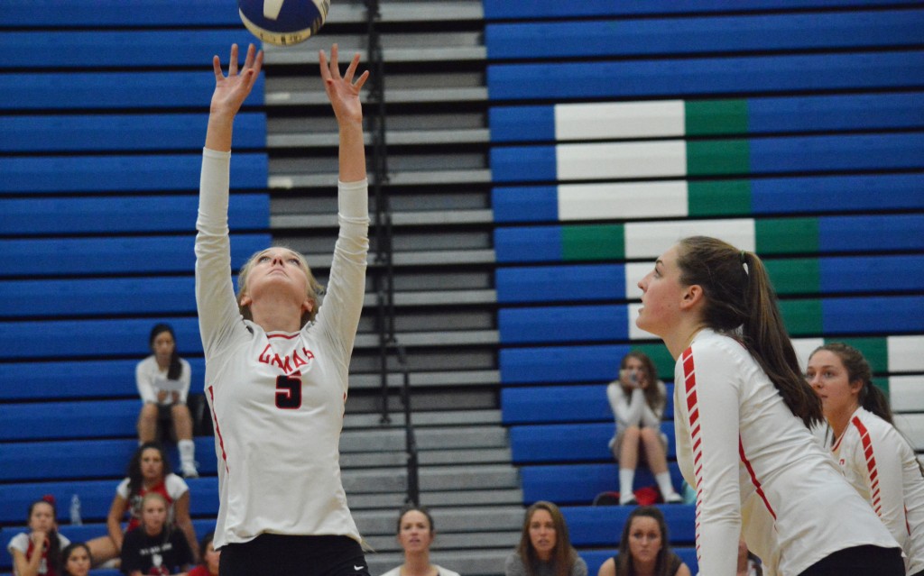 Aubrey Stanton sets up the volleyball for Colleen McAvoy during the Sept. 21 match against Mountain View. The Papermakers begin league play tonight at Skyview. The varsity match starts at 7:30 p.m.