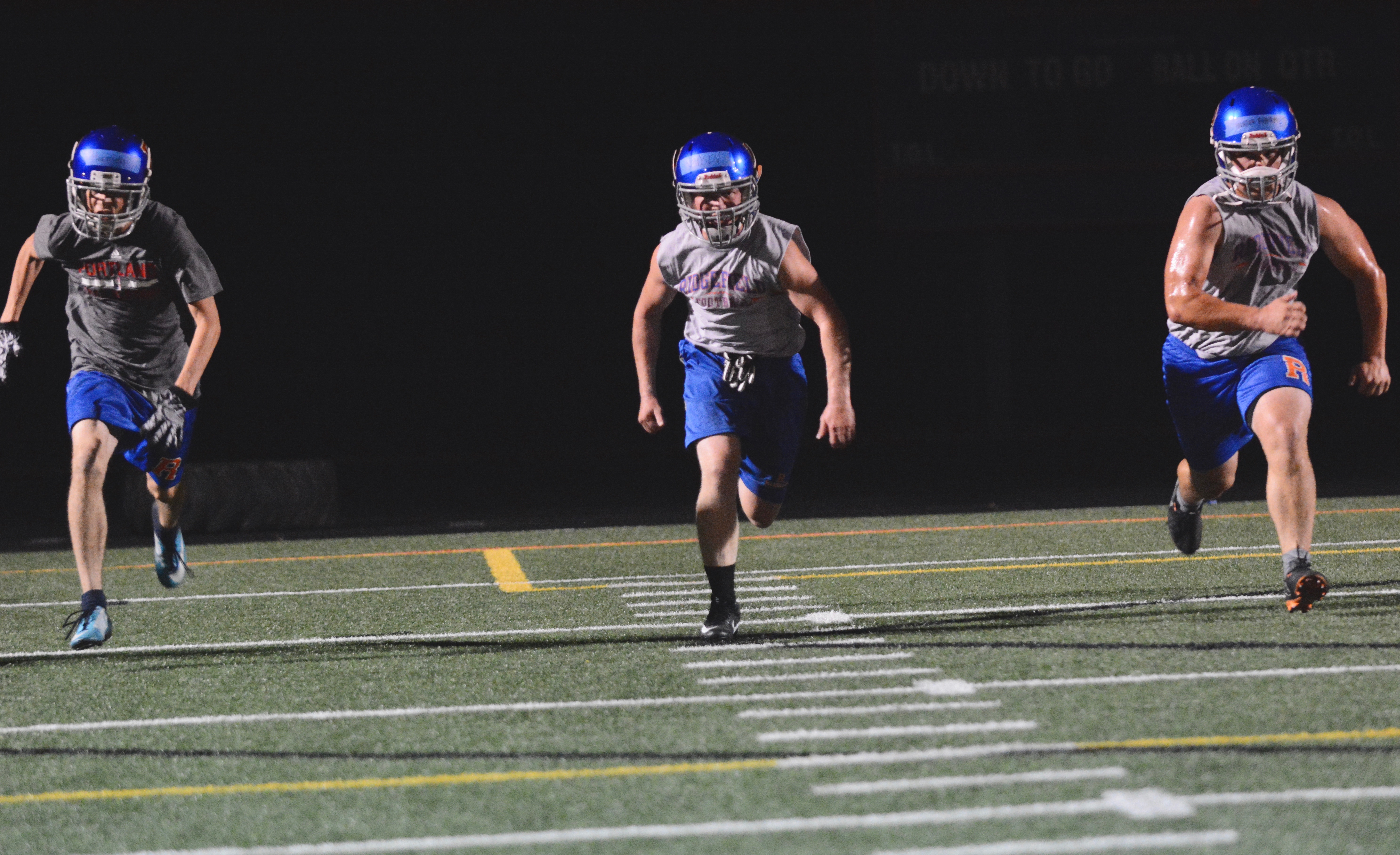Ridgefield running back Hunter Abrams sprints during a trunnings drill at the first practice of the fall — a midnight practice — at Ridgefield High School on Wednesday, Aug. 15, 2018 (Andy Buhler/Columbian Staff).