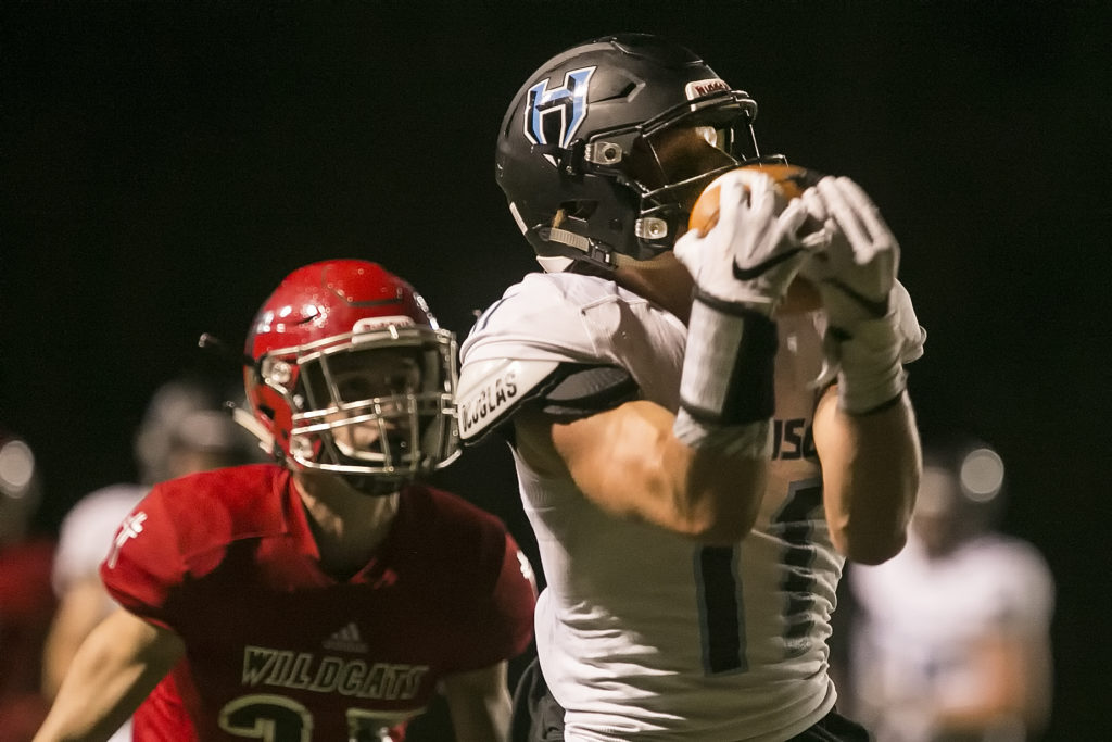 Hockinson's Sawyer Racanelli (right) makes a touchdown reception with Archbishop Murphy's Walter Hines trailing Thursday night at Archbishop Murphy High School in Everett on September 6, 2018.  (Kevin Clark / The Herald)