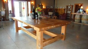 Coelho Winery's tasting room and their massive table center piece made with reclaimed wood