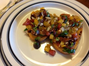 My husband loves bruschetta. That's why his portion seemingly overwhelms the dried peasant bread. But you can see why this dish is best eaten with a knife and fork.