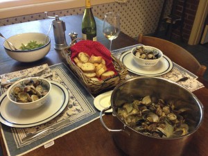 Steamer clams, green salad and french bread for dipping in the clam broth on an everyday meal at the Cleavelands.