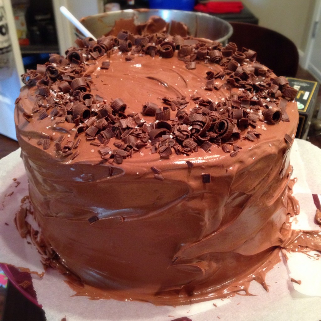 Beautiful layers of buttercream, moist chocolate cake, and creamy dark chocolate frosting